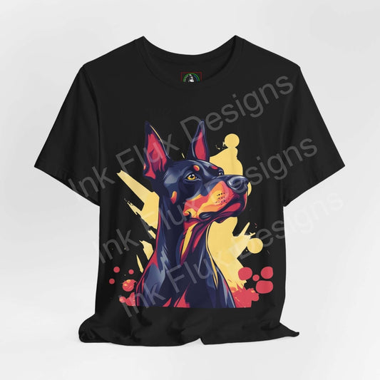 Black graphic tee featuring a vibrant Dobermann portrait with abstract yellow and red splashes, ideal for dog lovers and T-shirt enthusiasts.