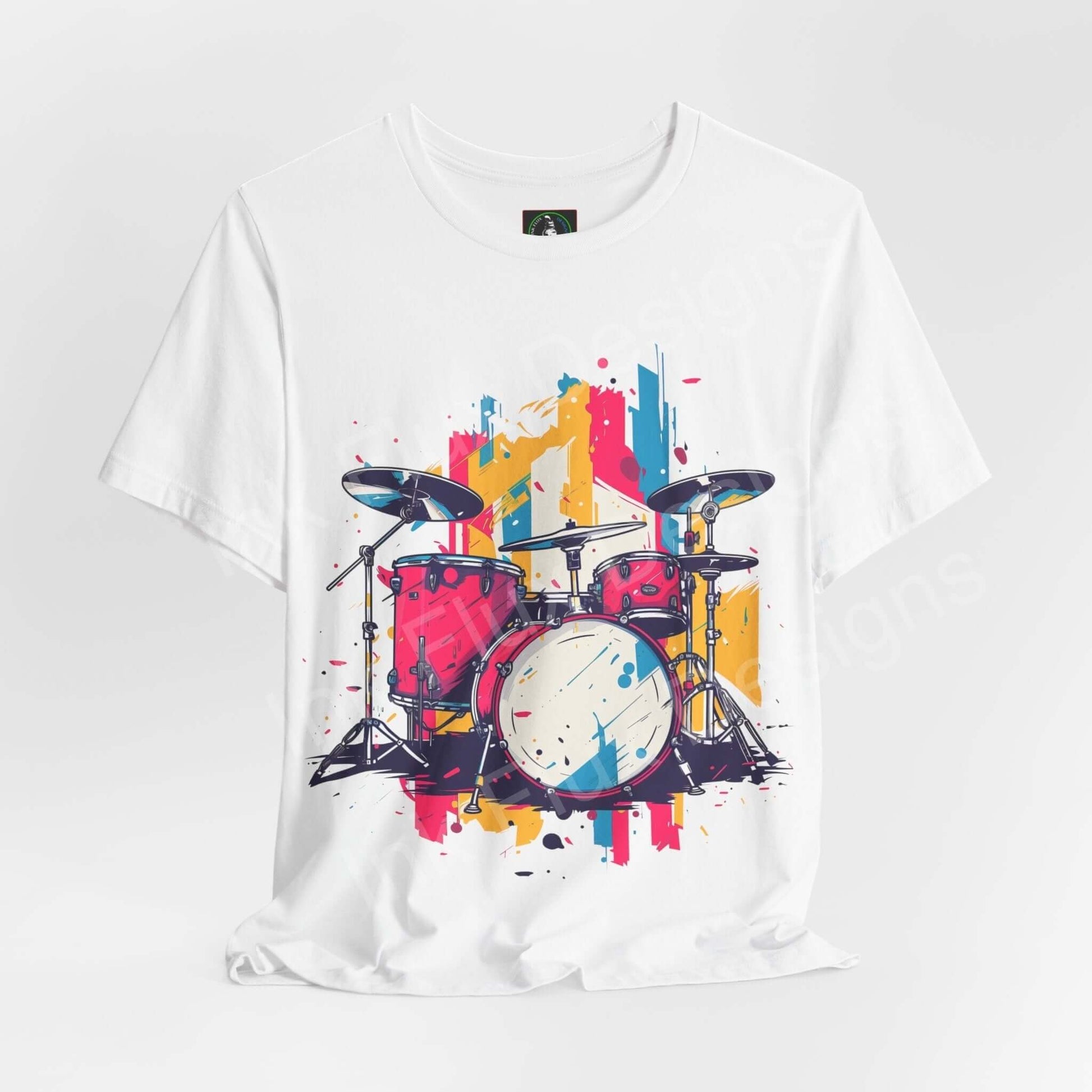 Bold graphic tee featuring a colorful drum set design on a white, unisex jersey T-shirt, perfect for music lovers and casual wear.