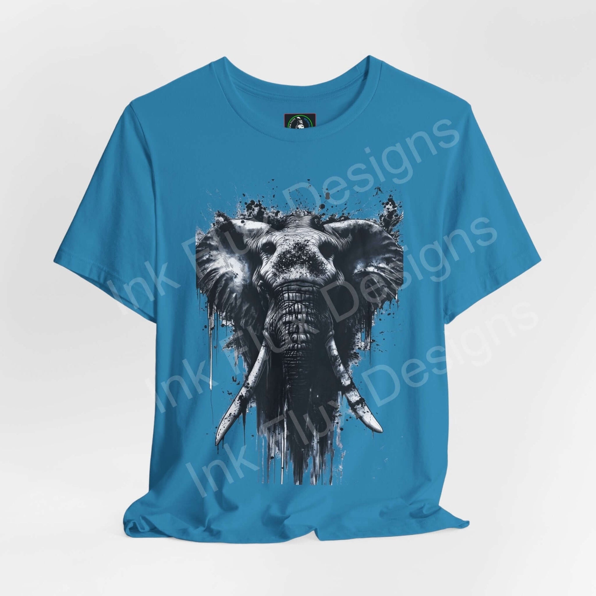 Blue unisex T-shirt featuring a striking black and white elephant graphic design, ideal for fans of spirit animals and graphic tees.