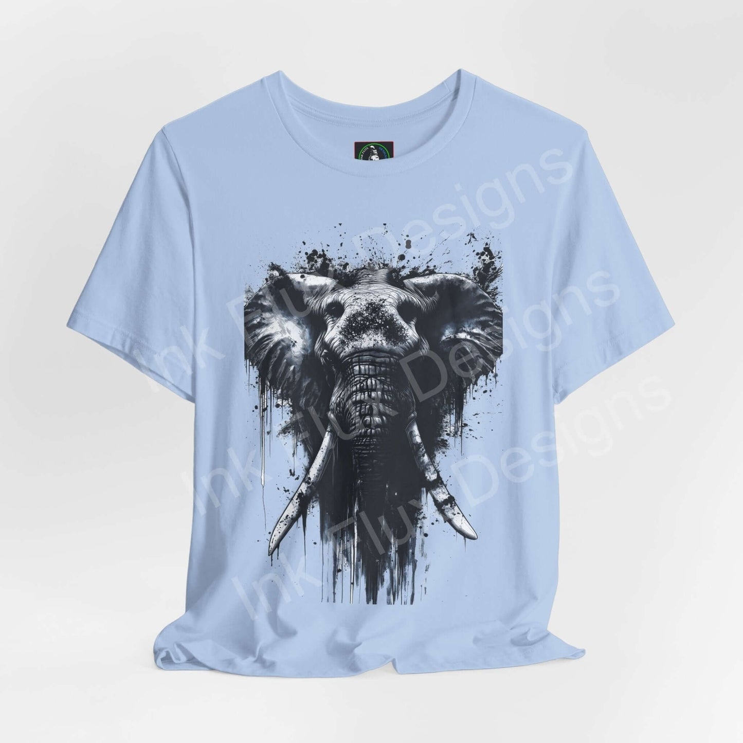 Light blue unisex T-shirt featuring a black and white graphic of an elephant, ideal for lovers of spirit animals and graphic tees.