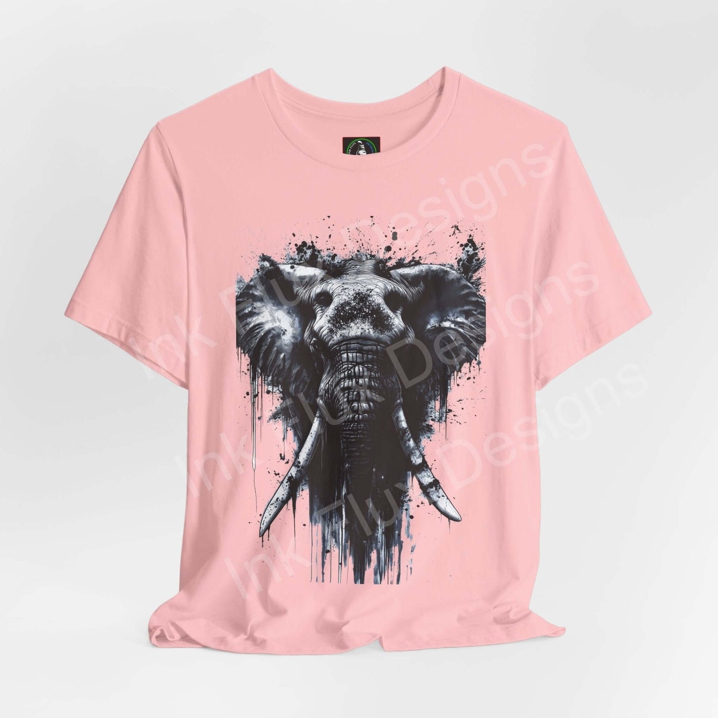 Pink unisex T-shirt with a black and white graphic of an elephant, labeled 'Elephant Spirit II', ideal for lovers of spirit animals and graphic tees.