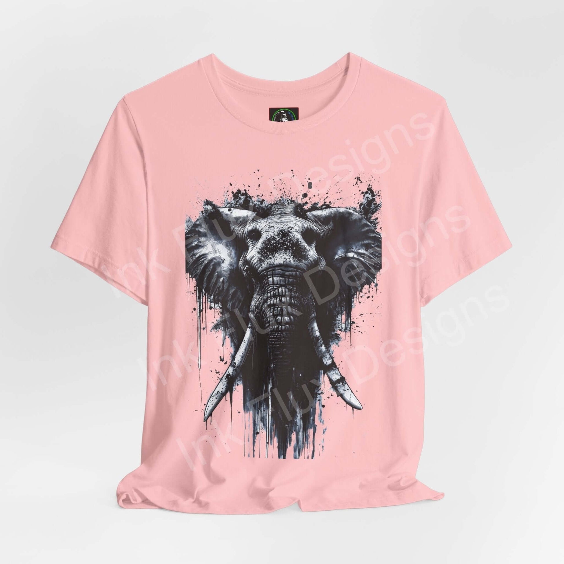Pink unisex T-shirt with a black and white graphic of an elephant, labeled 'Elephant Spirit II', ideal for lovers of spirit animals and graphic tees.