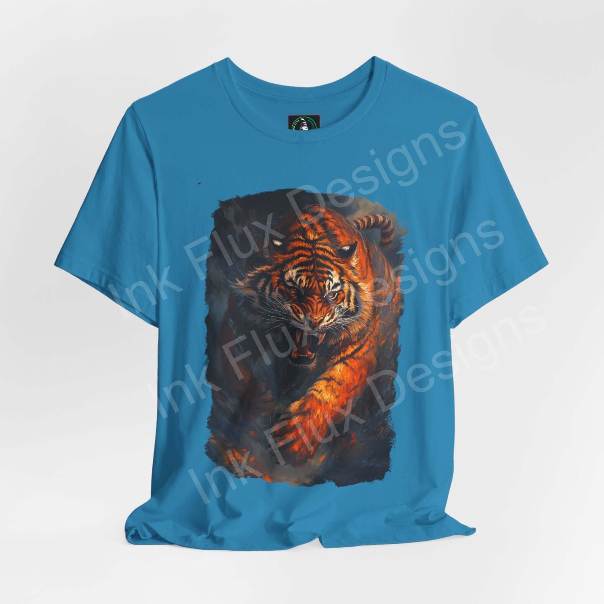 Blue unisex T-shirt featuring a graphic of an enraged Siberian tiger, ideal for fans of spirit animals and stylish, ethical apparel.