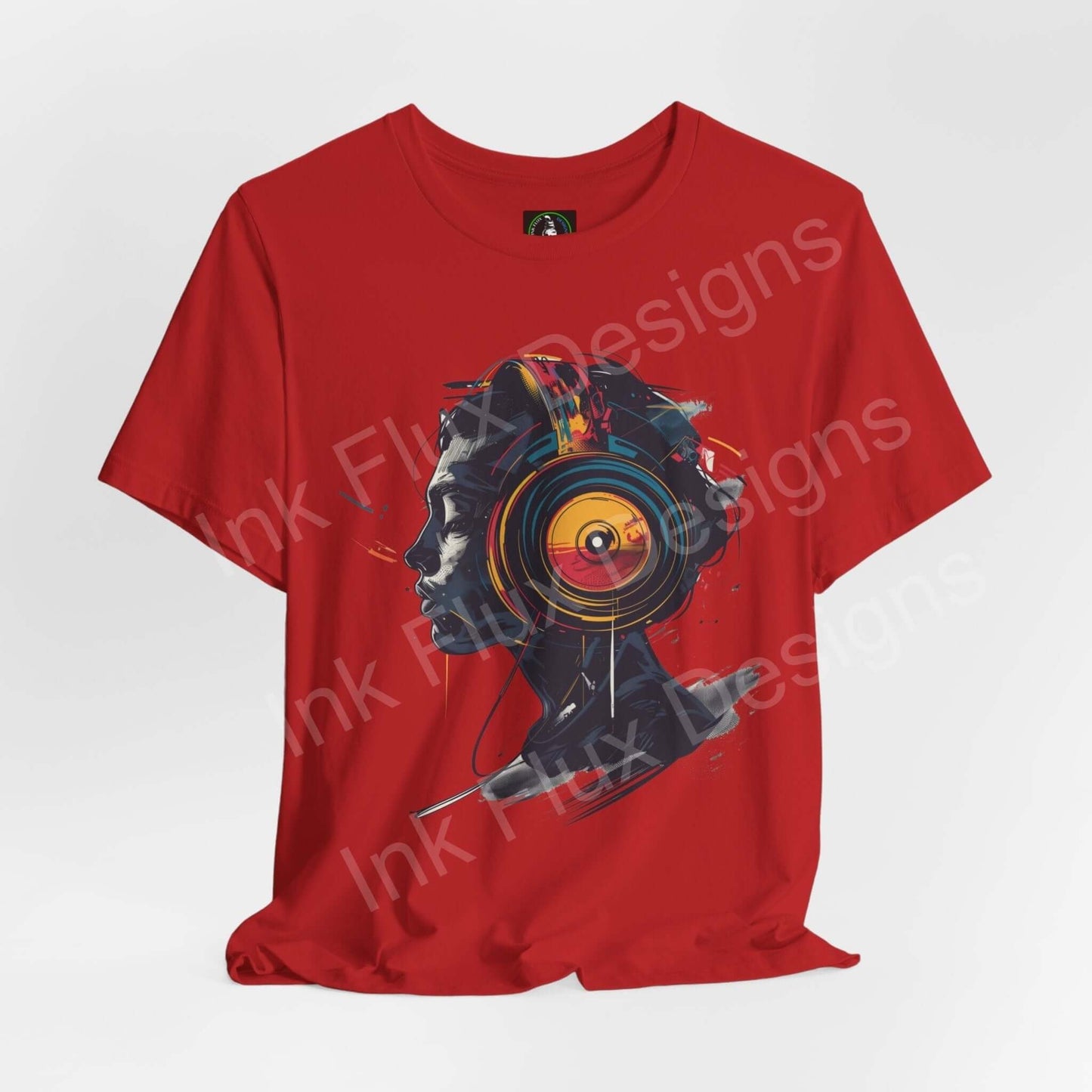 Red unisex jersey T-shirt featuring an abstract graphic design with vibrant color explosion, crafted ethically by Bella+Canvas with emphasis on comfort and sustainability.