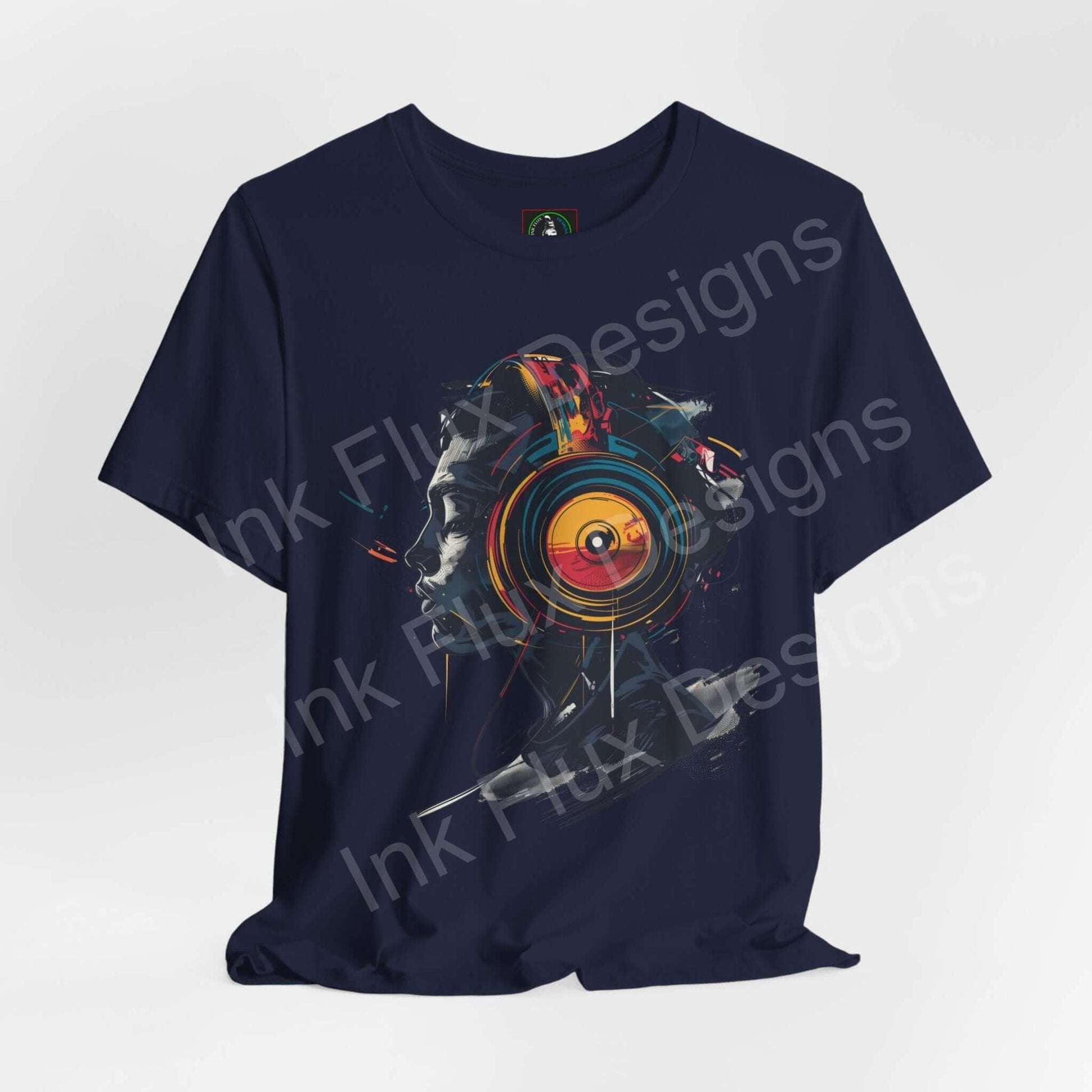Navy blue unisex jersey T-shirt featuring bold graphic design with vibrant abstract art and circular patterns, ethically made by Bella+Canvas.