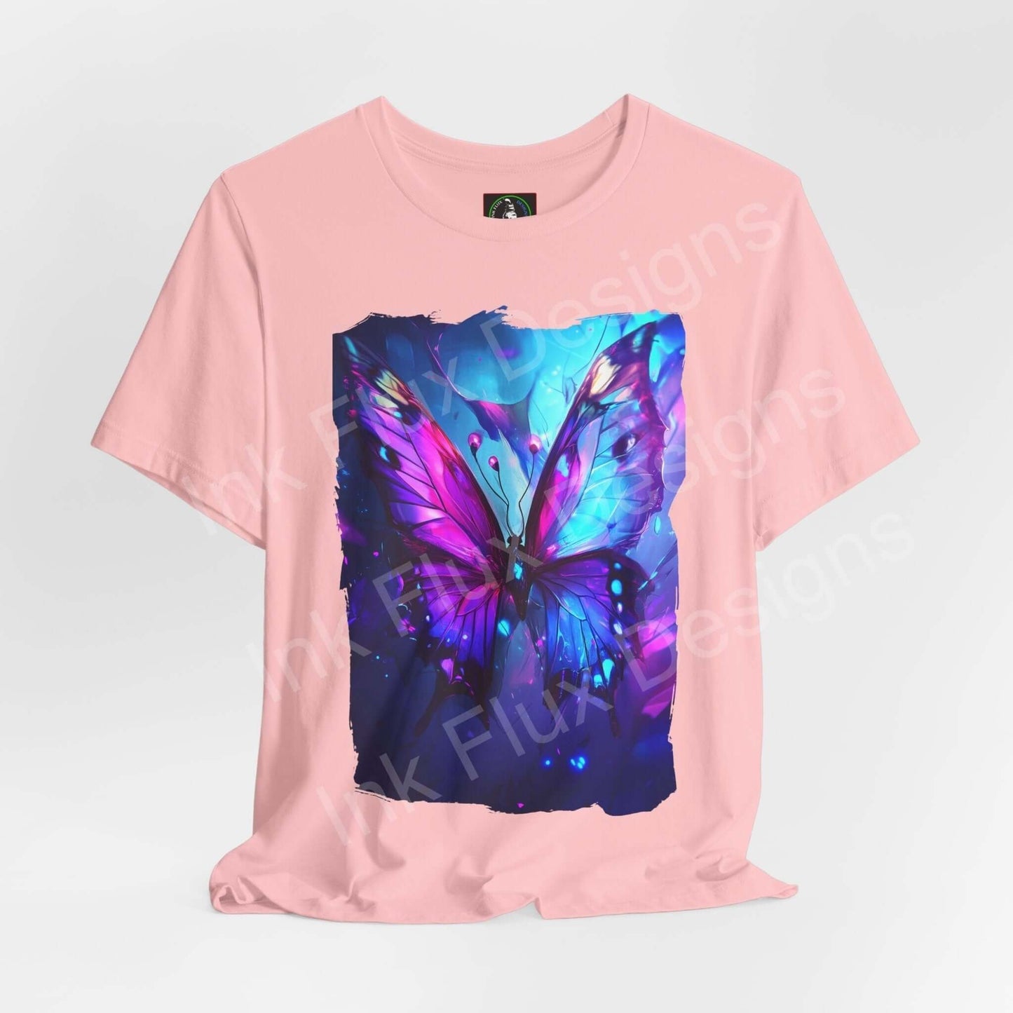 Ethereal Butterfly graphic tee in pink, featuring a vibrant blue and purple butterfly design, perfect for fans of spirit animals and stylish, comfortable wear.