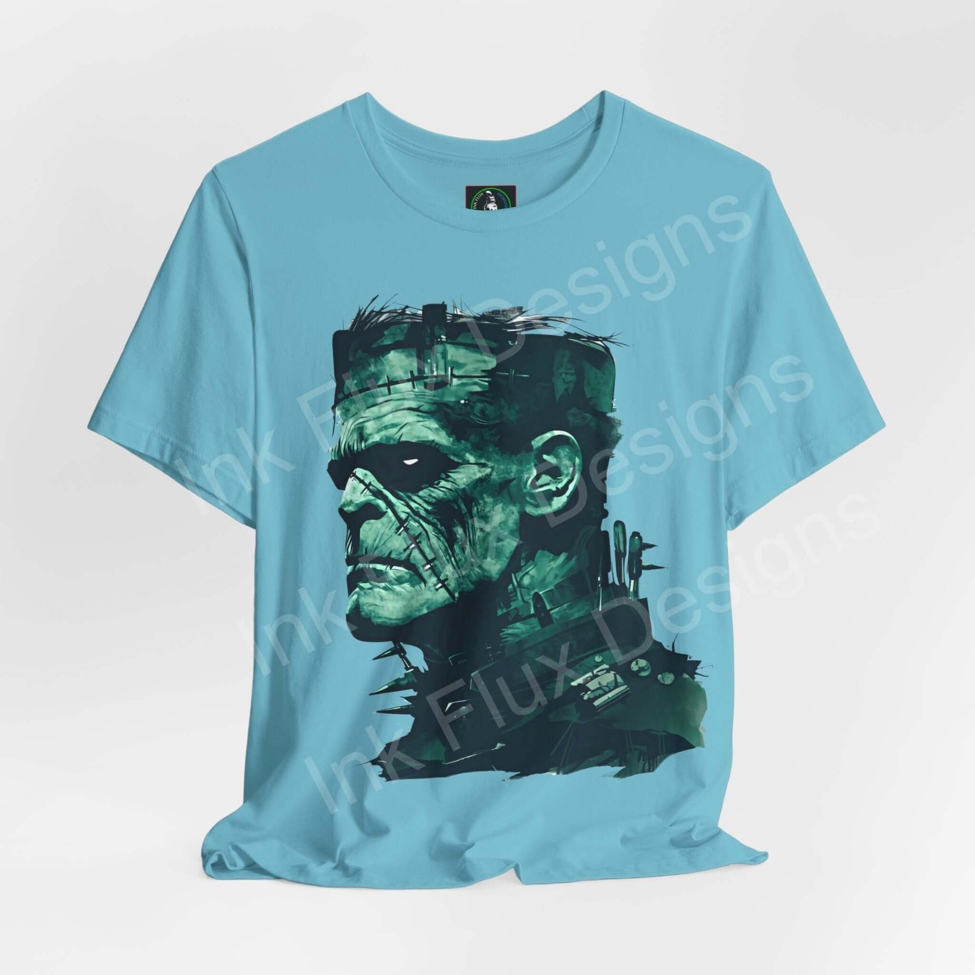 Light blue unisex jersey T-shirt featuring a graphic design of Frankenstein's face, ideal for Halloween and casual wear