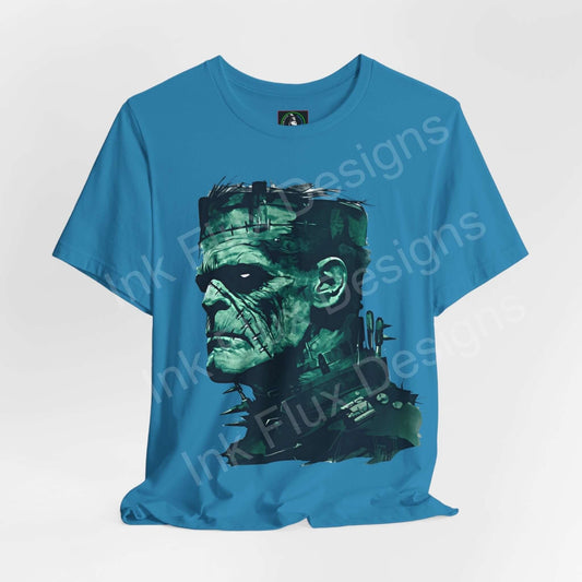 Frankenstein graphic on blue unisex T-shirt, ideal for Halloween, stylish and breathable cotton tee by Bella+Canvas.