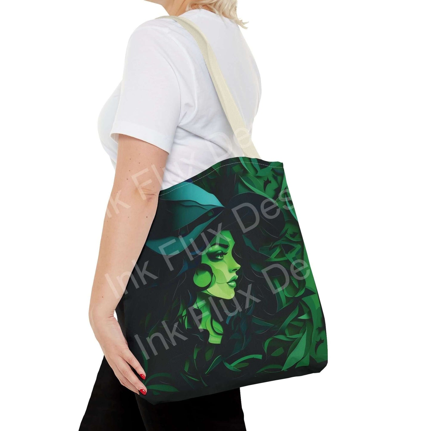 Woman carrying a green witch design tote bag with beige straps, highlighting its all-over print and durable polyester material.