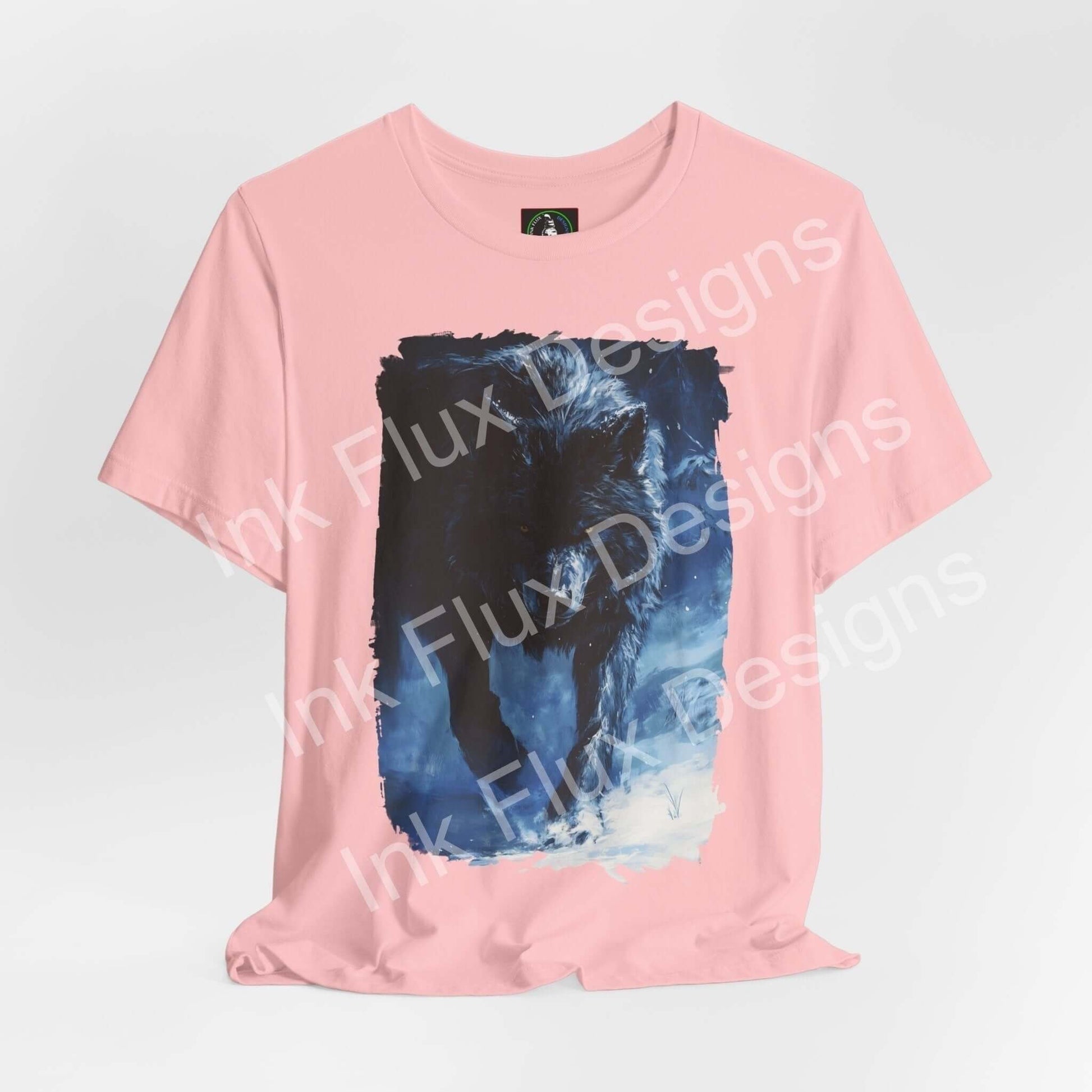 Pink unisex T-shirt featuring a graphic print of a wolf head in blue tones, from the Grey Wolf II collection by Bella+Canvas