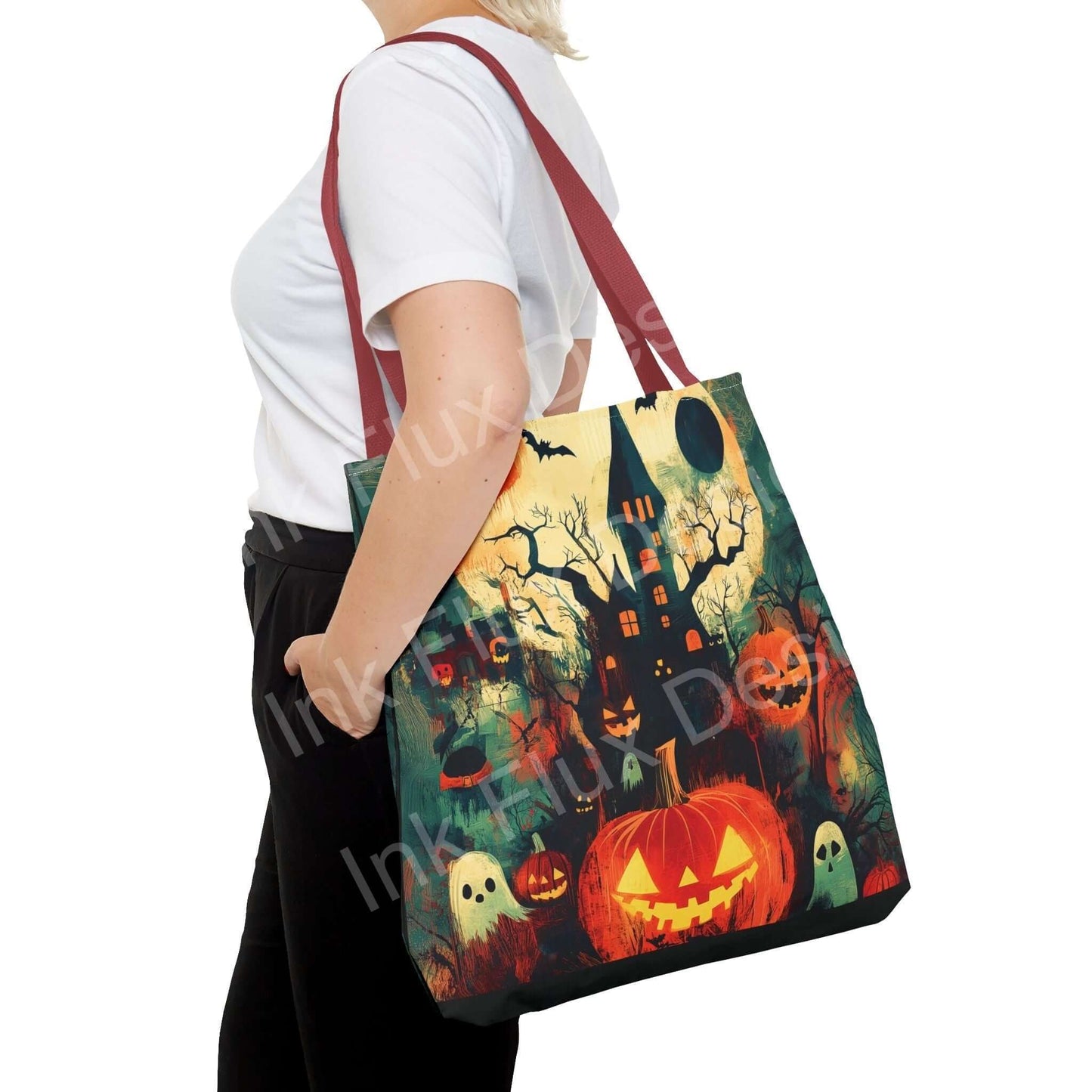 Woman carrying a Halloween-themed all-over print tote bag featuring pumpkins, ghosts, and haunted house designs.