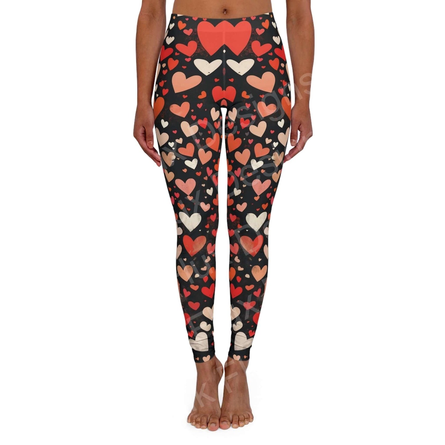 Woman wearing Hearts Collage Leggings with bold heart designs, front view, showcasing a skinny fit and double layer waistband.