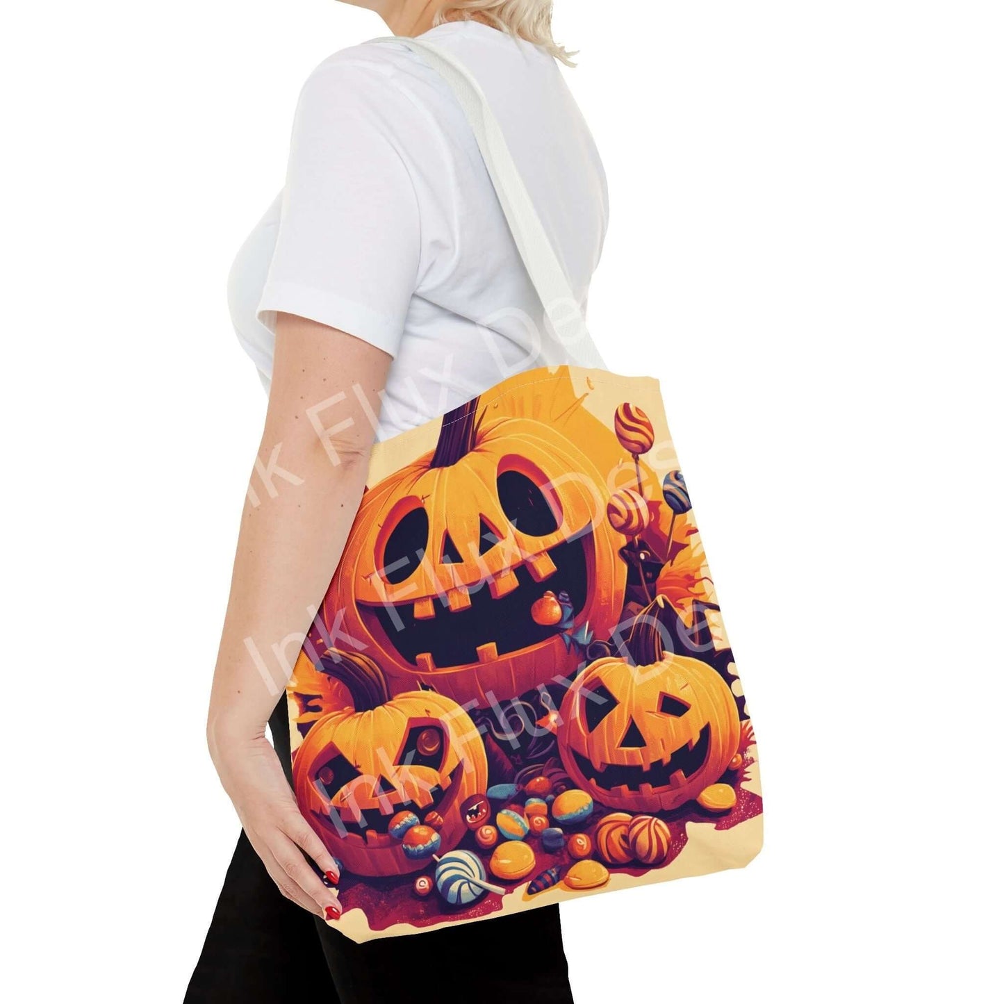 Woman carrying a Jack o' Lantern themed tote bag with vivid Halloween print and adjustable straps