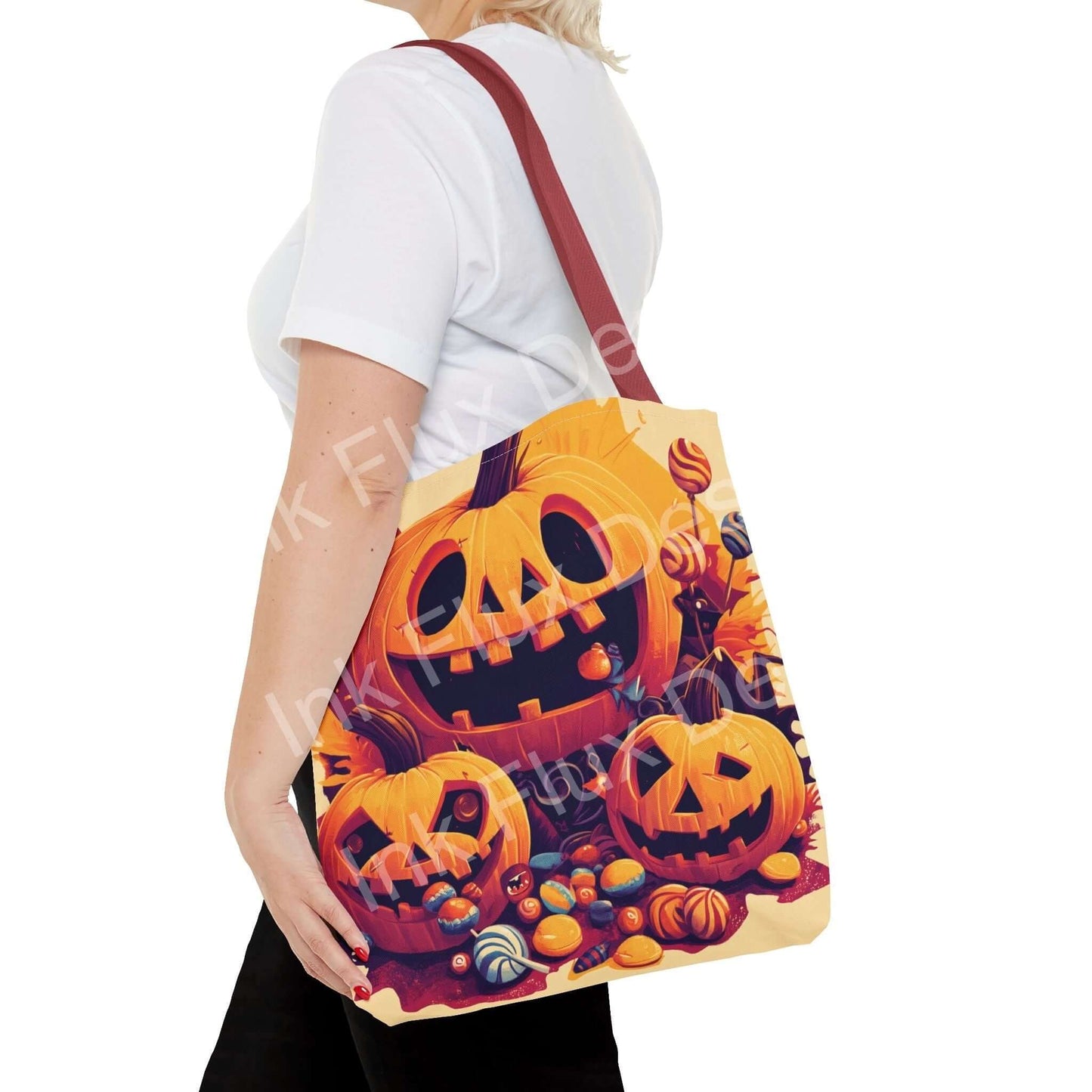 Woman carrying a Jack o Lantern Tote Bag featuring vibrant all-over pumpkin print and adjustable red strap