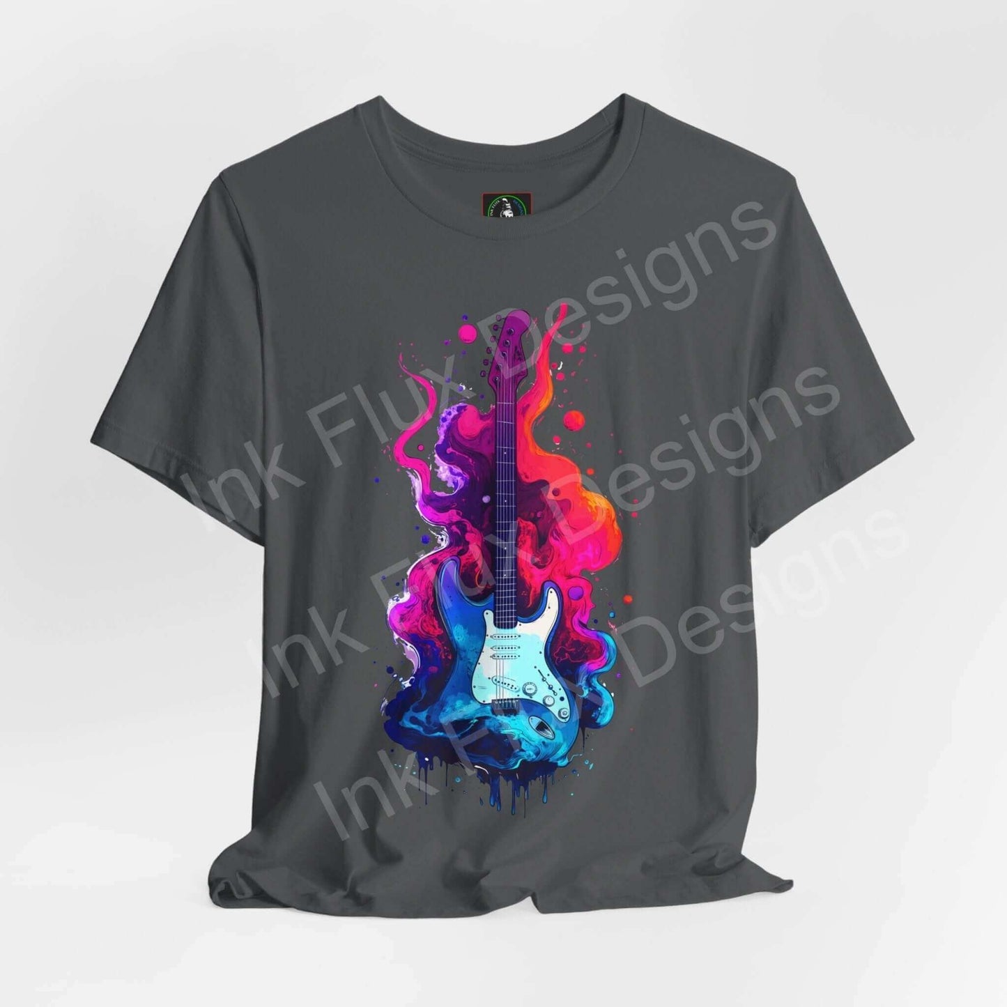 Gray unisex jersey T-shirt featuring a bold graphic of a colorful liquid guitar design in vivid pink and blue, showcasing a stylish and modern look.