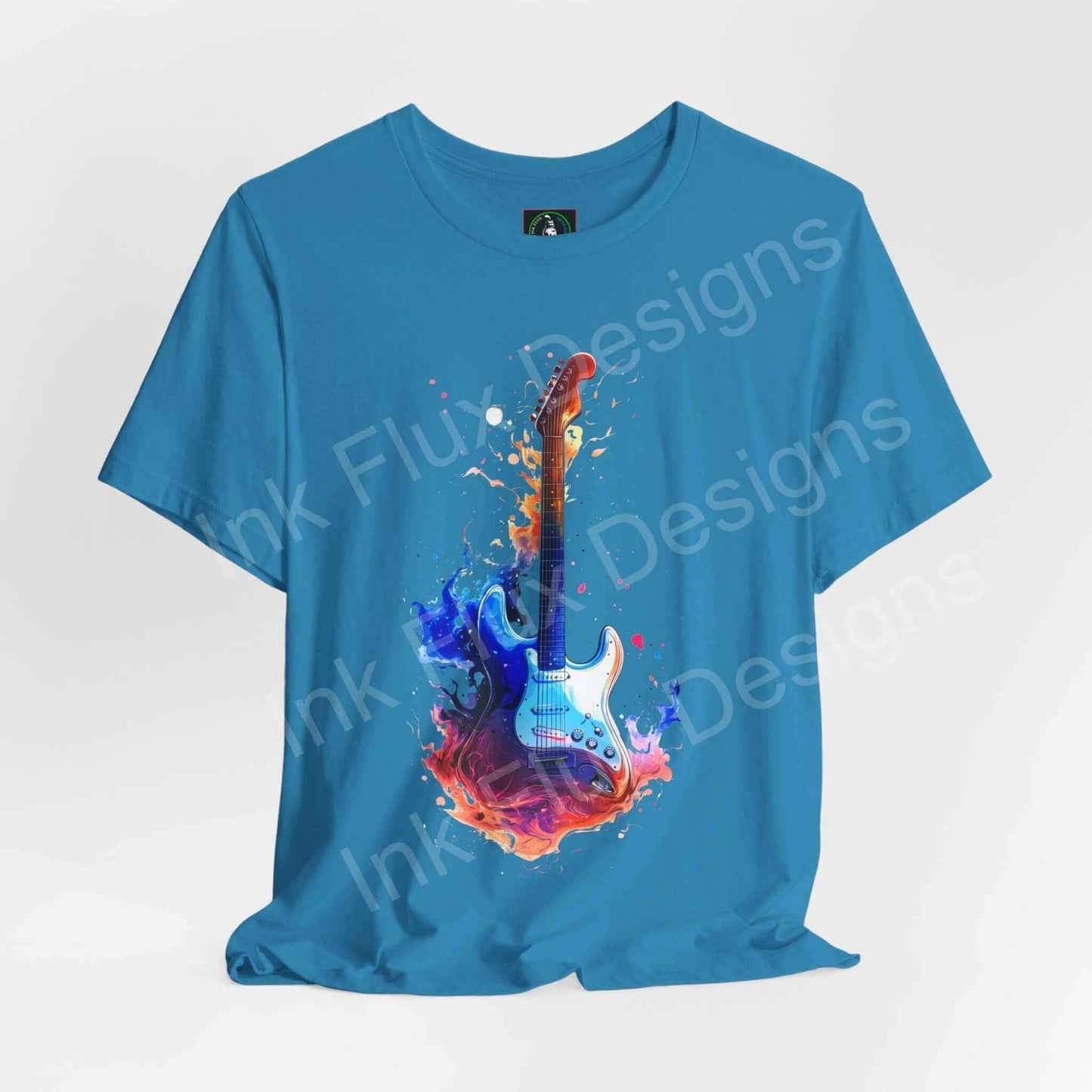 Bold graphic tee featuring a vibrant liquid guitar design on a blue unisex T-shirt, highlighting comfort and style.