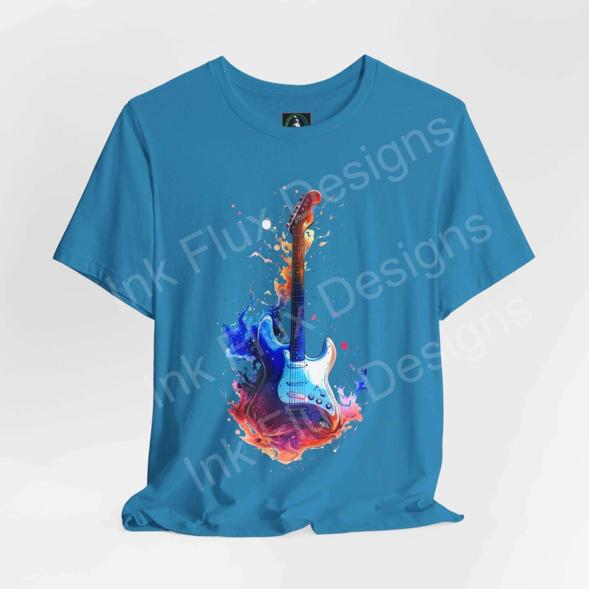 Bold graphic tee featuring a vibrant liquid guitar design on a blue unisex T-shirt, highlighting comfort and style.