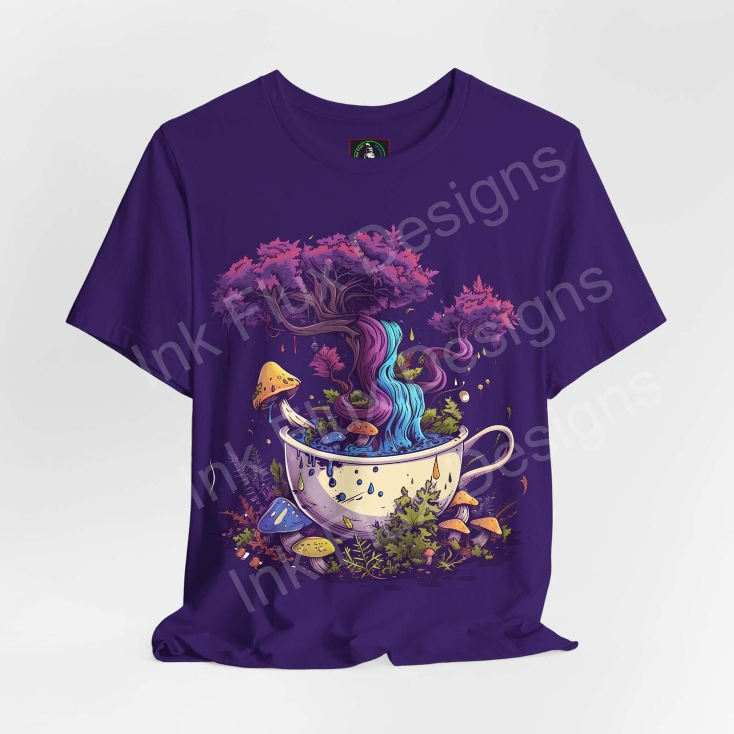 Trippy purple T-shirt featuring a bold psychedelic graphic of a tree and colorful mushrooms emerging from a tea cup.