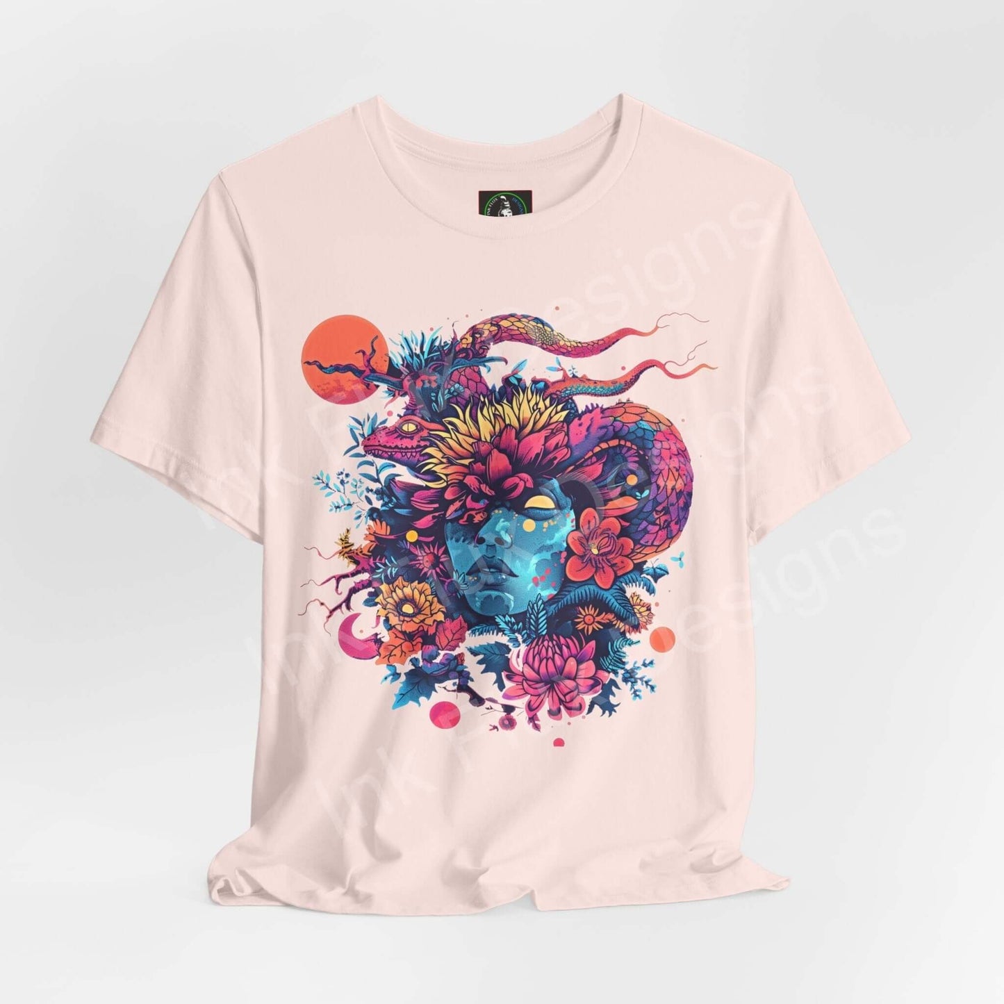 Unisex pink T-shirt with bold psychedelic graphic featuring a vibrant, trippy design of a colorful ram surrounded by floral and celestial elements.