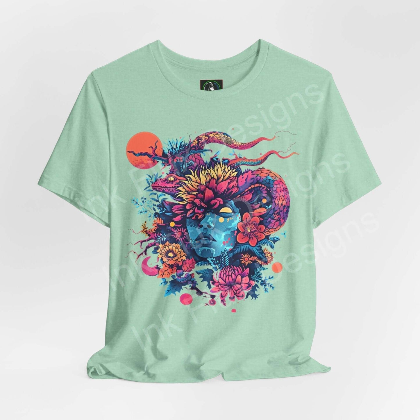 Unisex mint green tee with a vibrant, psychedelic graphic design featuring a fantastical creature and floral elements, perfect for a bold, trippy style.