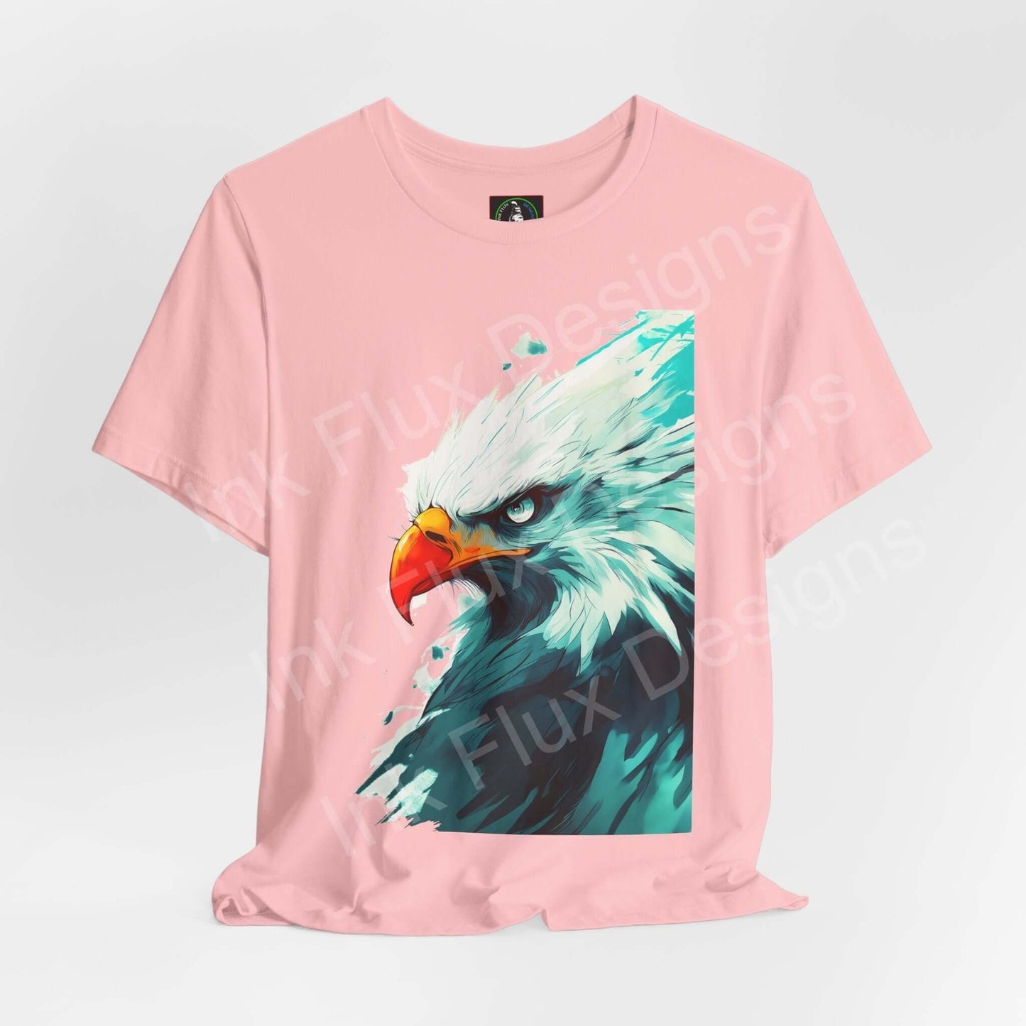 Pink Mighty Bald Eagle graphic tee by Bella+Canvas featuring a vibrant print of an eagle, ideal for lovers of spirit animals and ethically made T-shirts.