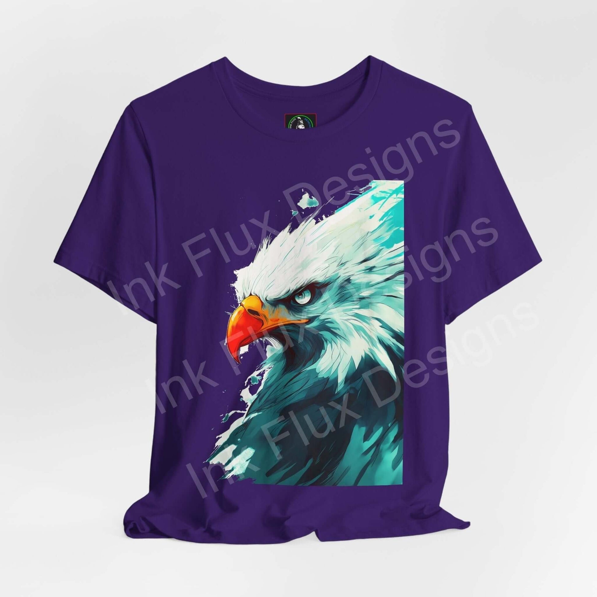 Purple unisex T-shirt featuring a vibrant graphic of a mighty bald eagle, ideal for fans of spirit animal and ethically made graphic tees.