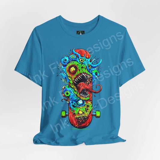 Bold graphic tee featuring a colorful monster skateboard design on a blue unisex jersey T-shirt by Bella+Canvas