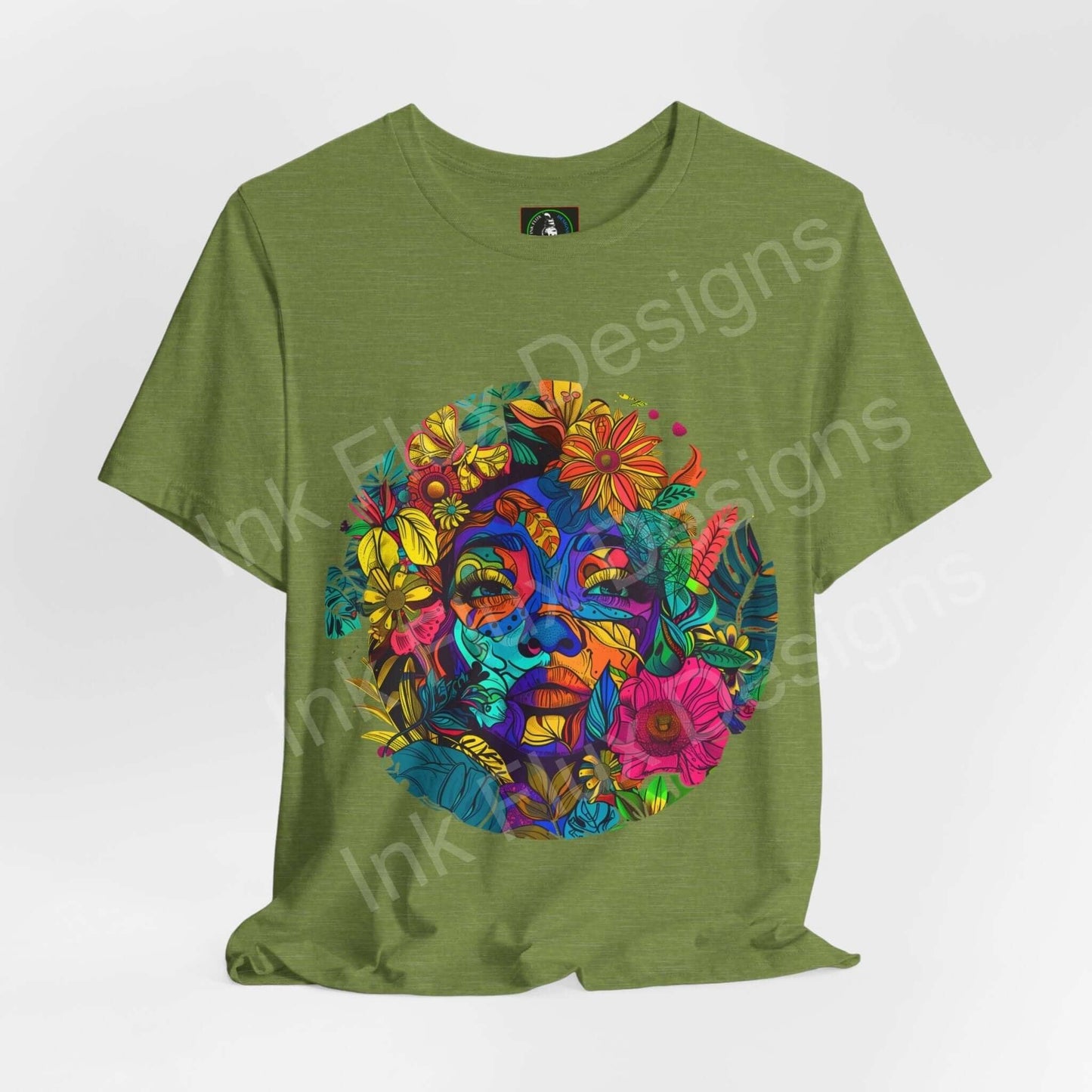 Green unisex T-shirt featuring a bold, psychedelic graphic of Mother Earth with vibrant, trippy floral and facial elements.