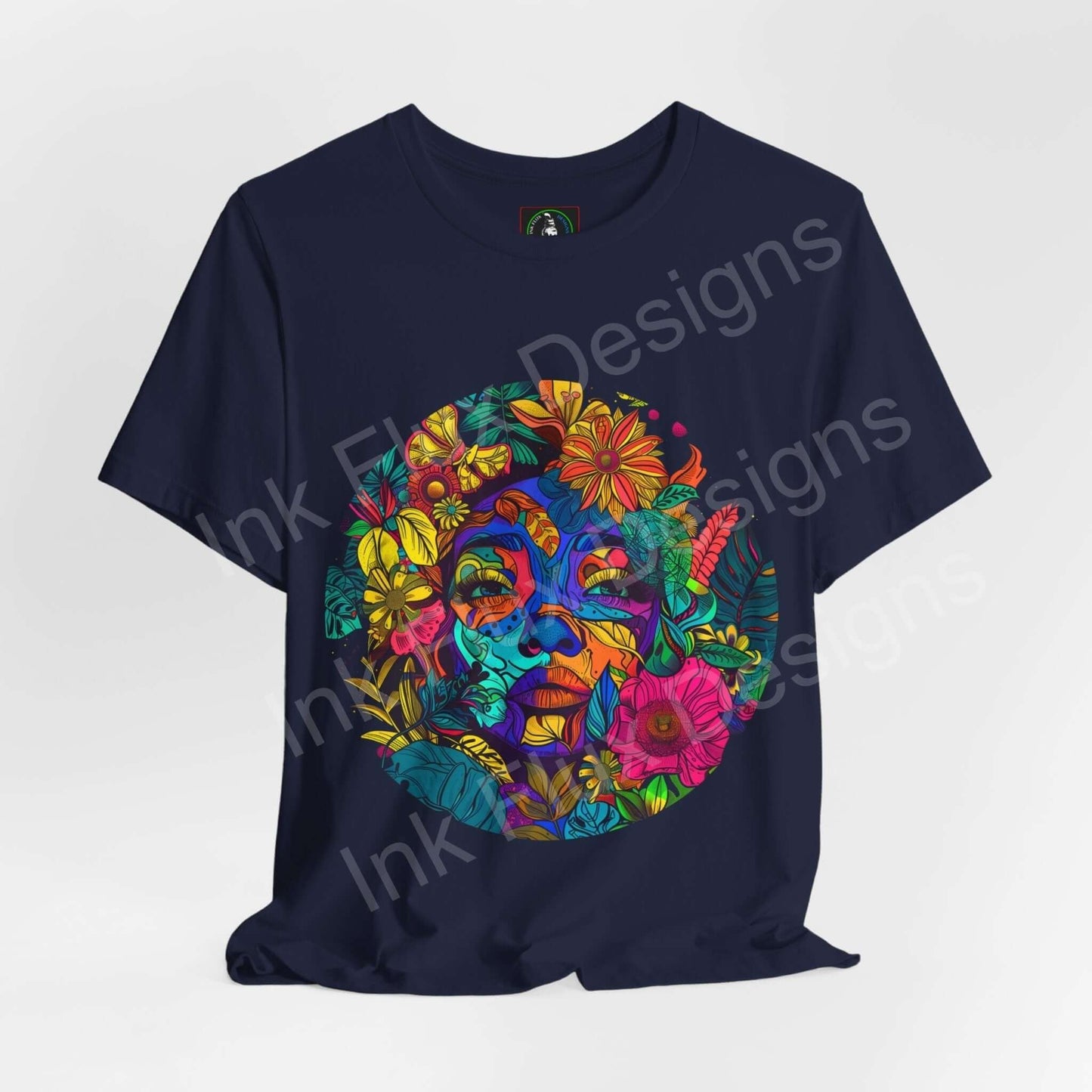 Navy unisex T-shirt with a bold, psychedelic Mother Earth graphic featuring vibrant, trippy floral and facial designs, ideal for those who love stylish graphic tees.