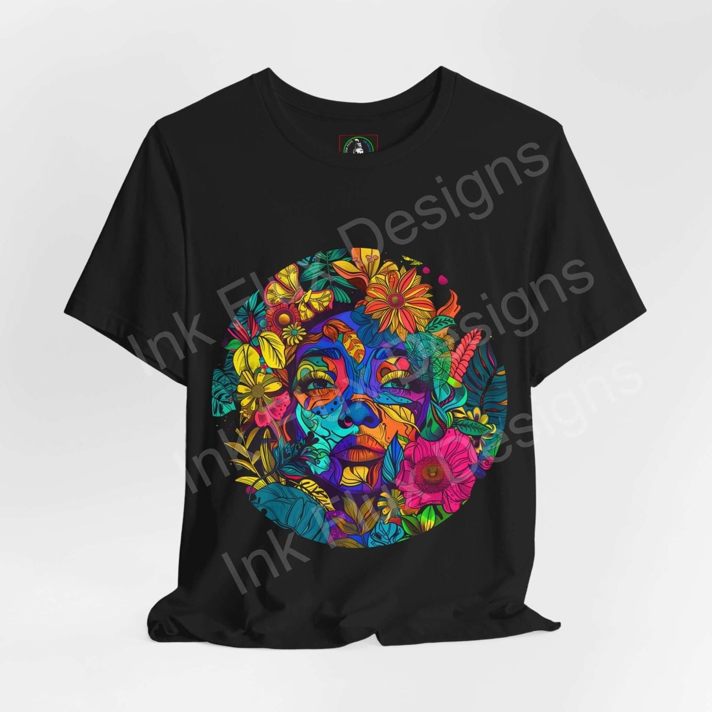 Black unisex T-shirt featuring a bold, psychedelic graphic with vibrant, colorful floral and facial designs, showcasing a trippy, artistic style.
