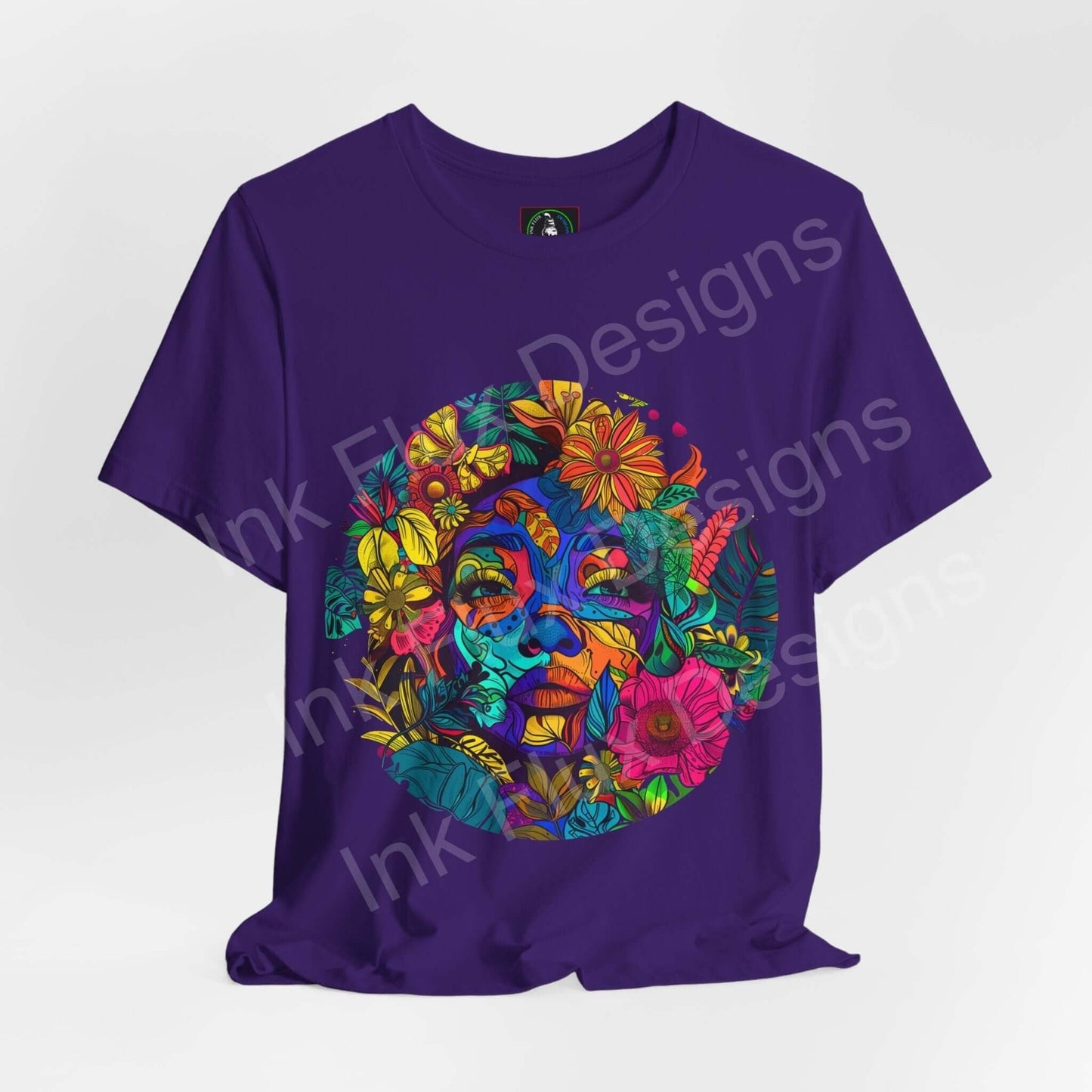 Purple unisex T-shirt with a bold, psychedelic graphic of Mother Earth, featuring vibrant, trippy floral elements on premium Airlume cotton fabric.