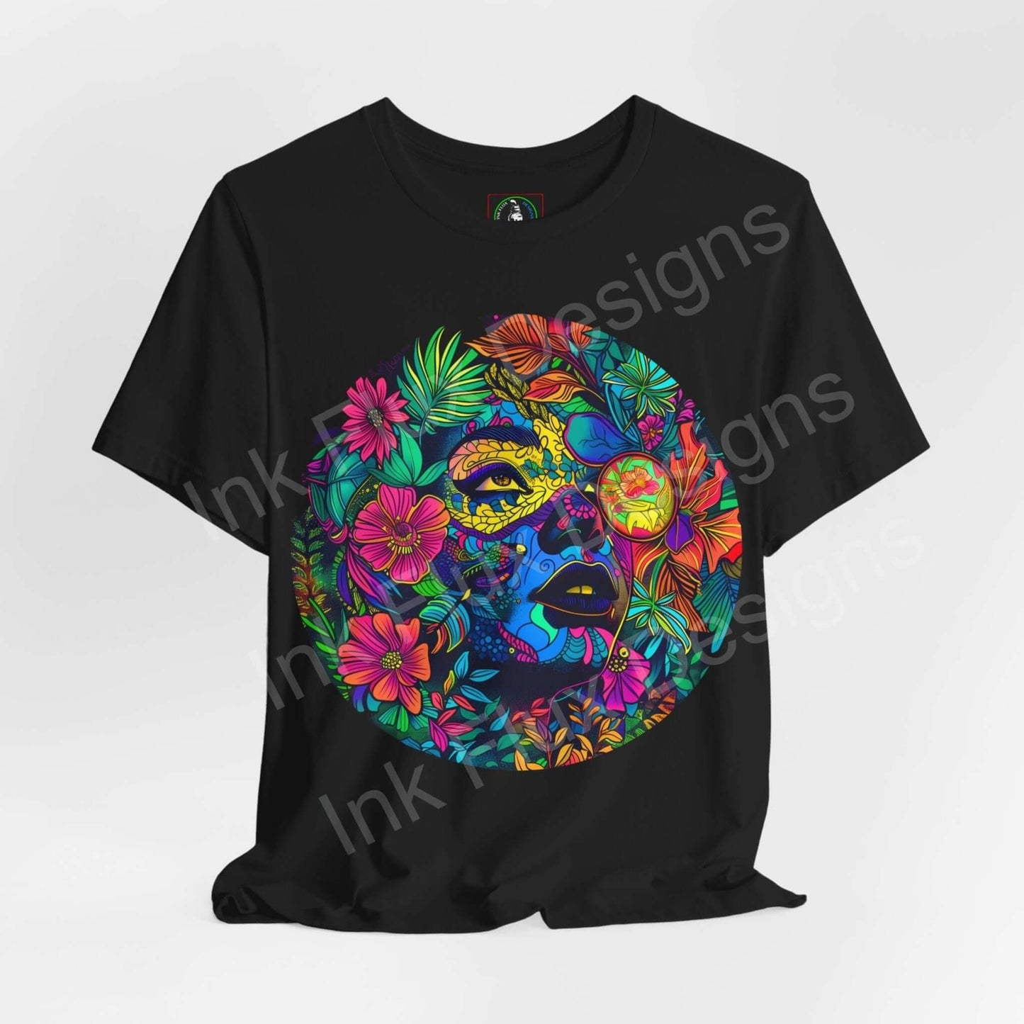 Unisex black T-shirt featuring a bold psychedelic graphic with vibrant, trippy floral and face design, from the Mother Earth II collection by Bella+Canvas.