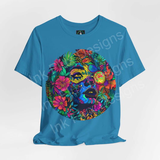 Psychedelic trippy graphic tee featuring bold, colorful floral and face design on a blue unisex jersey T-shirt by Bella+Canvas, emphasizing style and comfort.