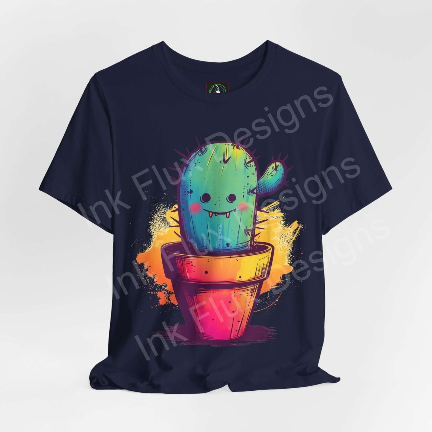 Navy unisex jersey T-shirt featuring a whimsical graphic of a smiling cactus in a colorful pot, highlighted by vibrant paint splatter, ideal for T-shirt enthusiasts looking for unique graphic tees.
