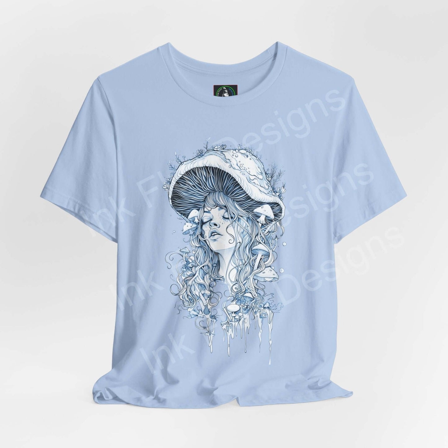 Light blue unisex T-shirt featuring a psychedelic graphic of a woman with a mushroom cap, embodying a trippy, ethereal aesthetic ideal for bold graphic tee enthusiasts.