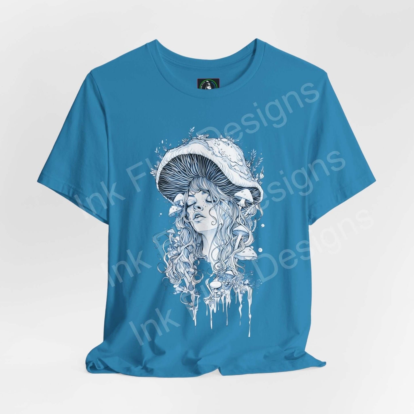 Blue unisex T-shirt featuring a bold, trippy graphic of a woman with mushroom cap hair, part of our 'Mushroom lady II' psychedelic graphic tees collection.