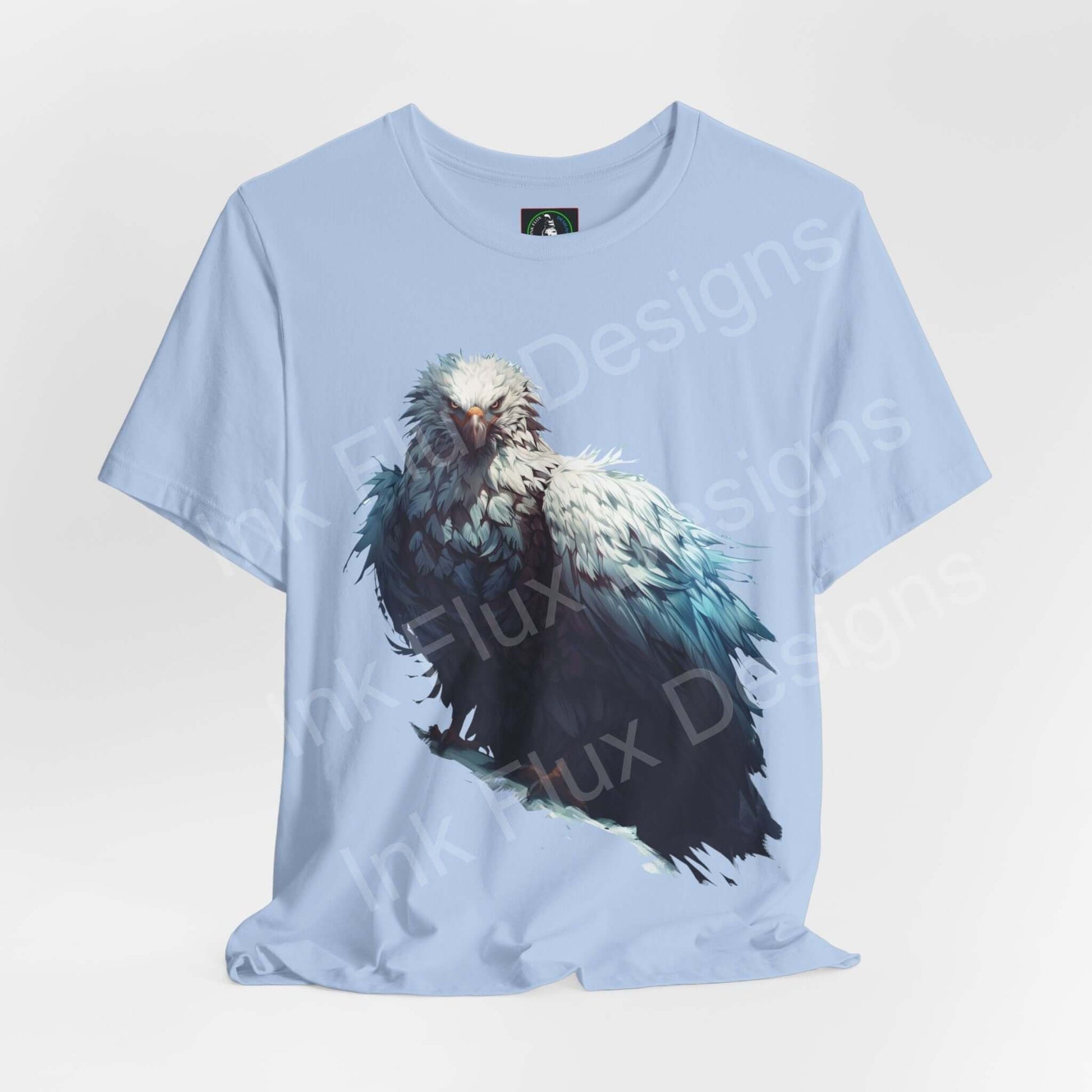 Light blue unisex T-shirt featuring a graphic of a mythical white eagle, designed for comfort and style, by Bella+Canvas.