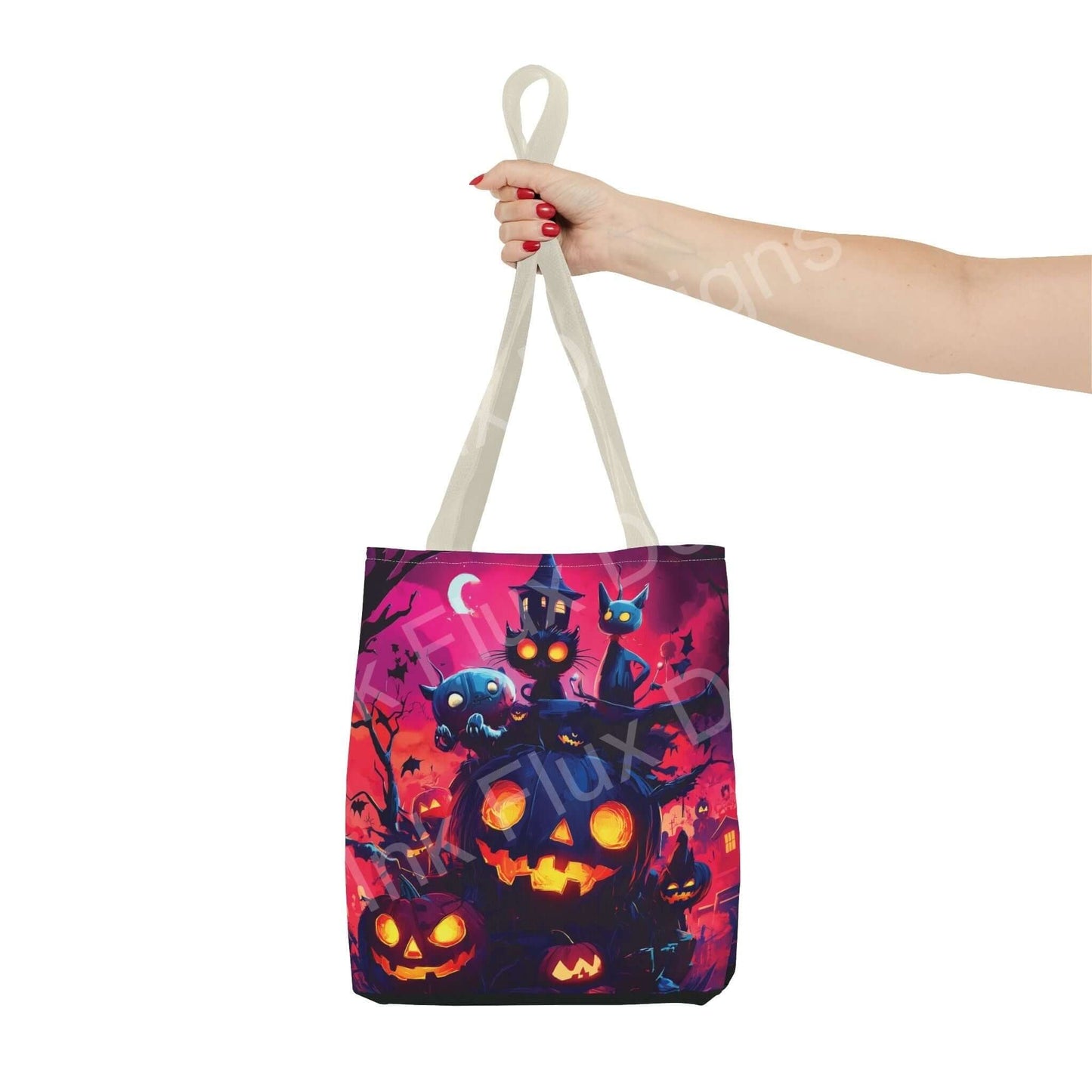 Woman holding a Night Jack o' Lanterns Tote Bag featuring vivid Halloween-themed print with colorful pumpkin and creepy cats design.