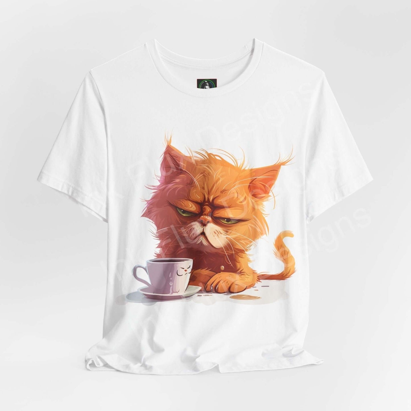 White graphic tee featuring a grumpy orange cat with a coffee cup, titled "Not a Morning Cat," perfect for cat and T-shirt enthusiasts.