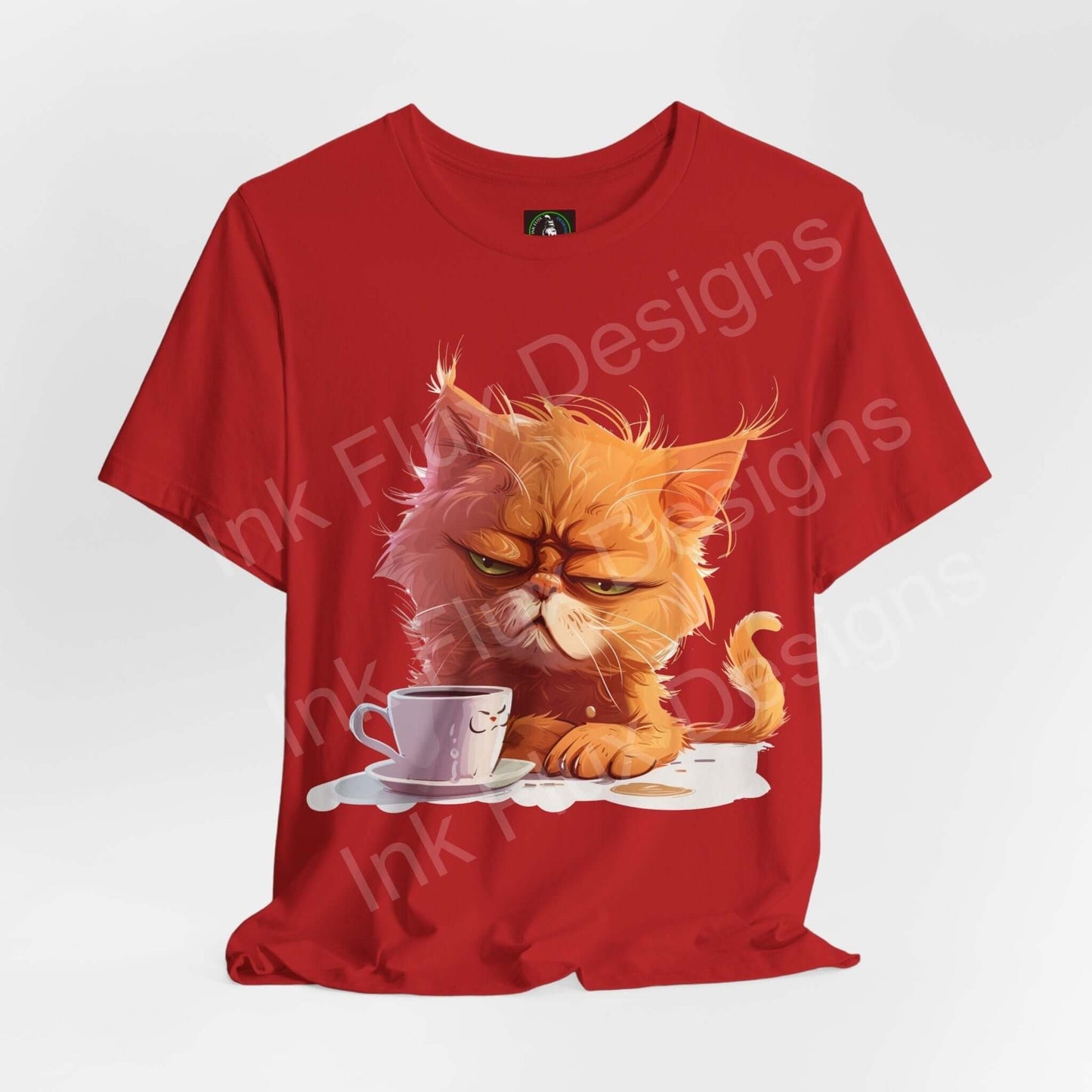Red graphic tee featuring a grumpy orange cat with a coffee cup design, perfect for cat lovers and casual wear.