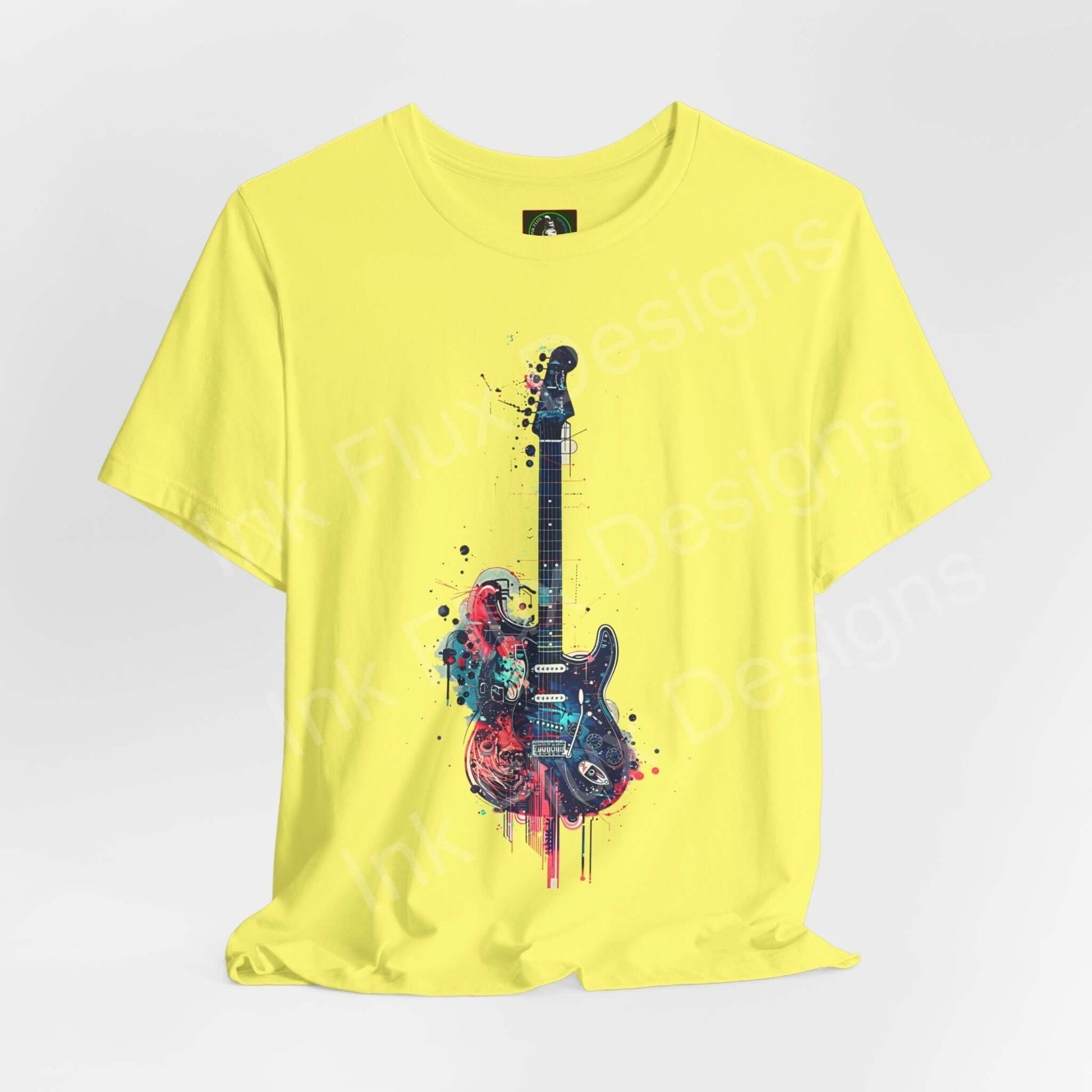Yellow unisex jersey T-shirt featuring a bold graphic of a paint-splattered guitar, designed by Bella+Canvas for style and comfort.