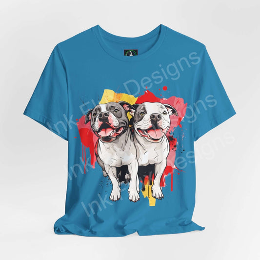 Blue unisex graphic tee featuring a vibrant design of two smiling pitbulls with a colorful paint splash background, ideal for dog lovers.