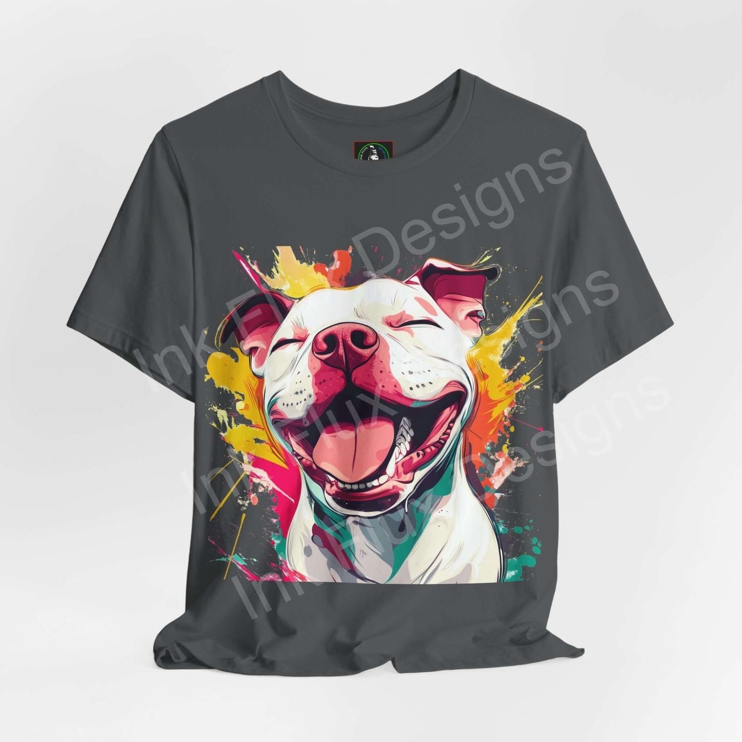 Grey unisex T-shirt featuring a vibrant graphic of a smiling Pitbull surrounded by colorful splashes, perfect for dog lovers and fashion enthusiasts.