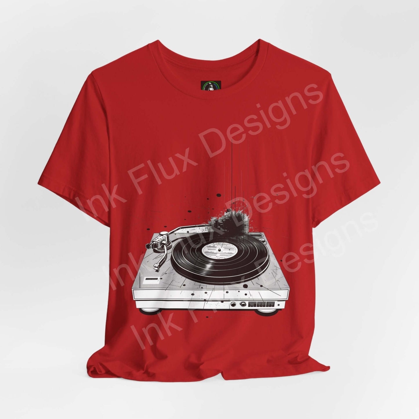Red unisex T-shirt with bold graphic of a record player design, offering style and comfort, by Bella+Canvas
