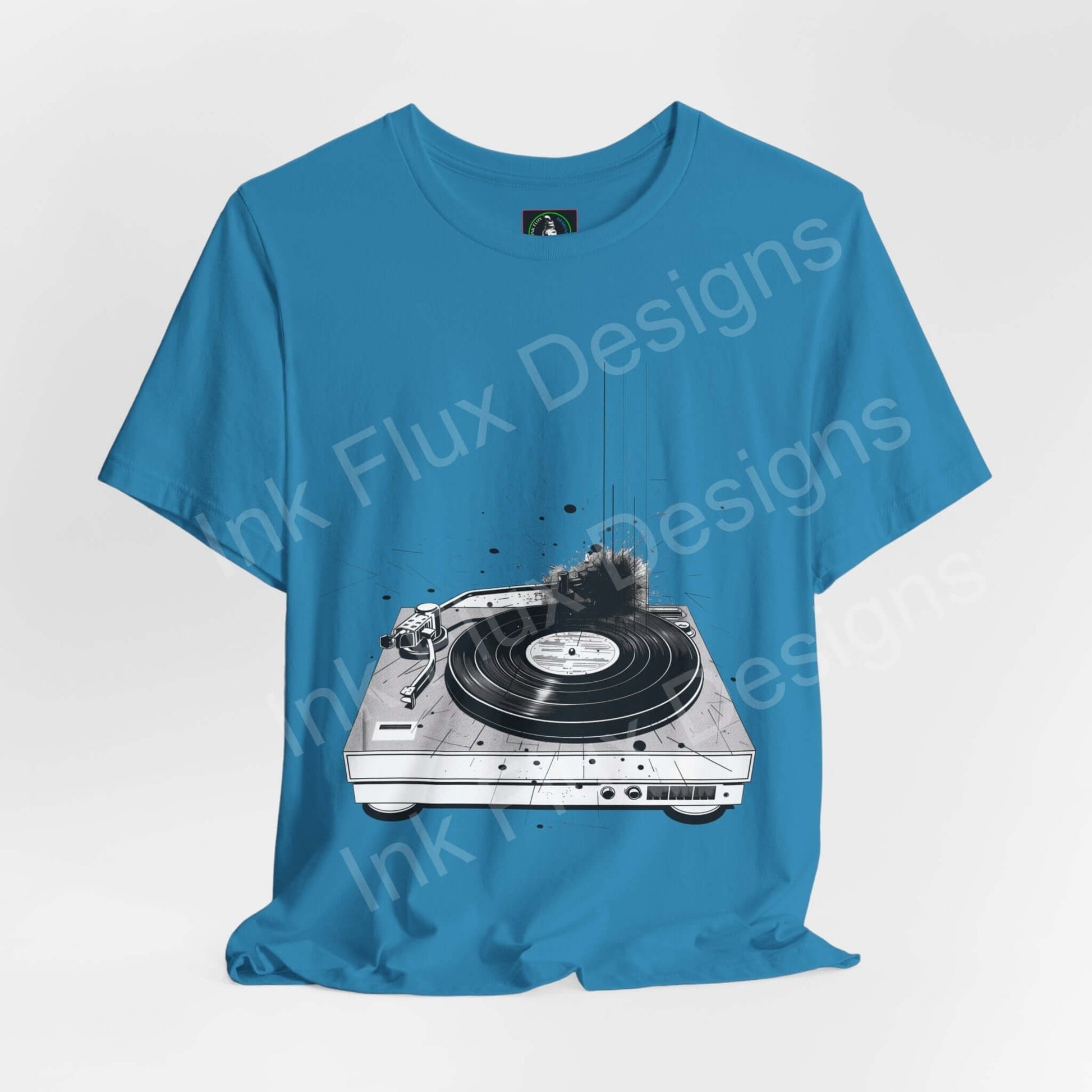 Blue unisex T-shirt featuring a bold graphic of a record player, part of the Record Player II collection by Bella+Canvas
