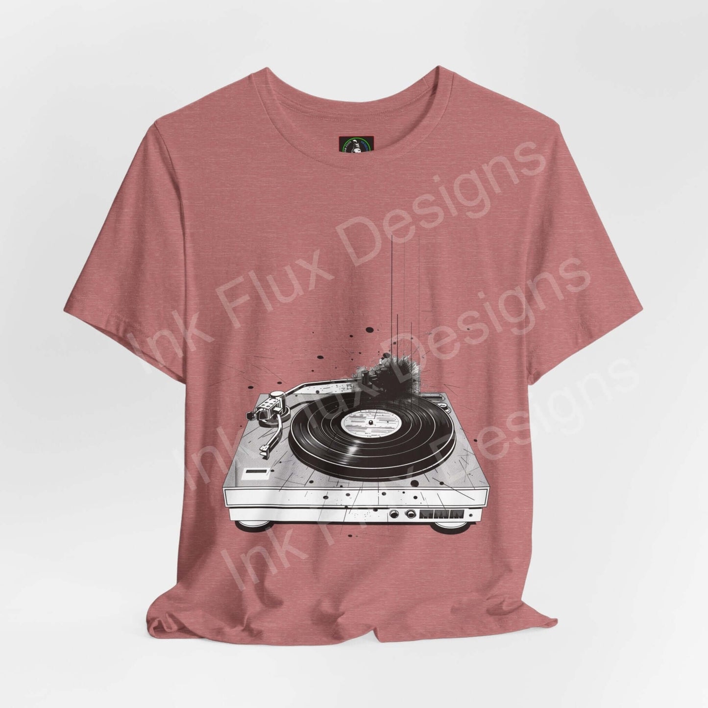 Unisex pink jersey T-shirt featuring a bold graphic of a record player, ethically made by Bella+Canvas, ideal for style and comfort.