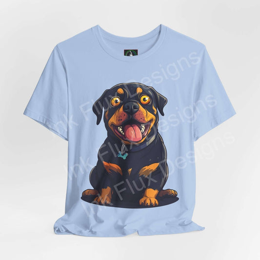Light blue unisex T-shirt featuring a playful graphic of a Rottweiler puppy, ideal for dog lovers and casual wear.