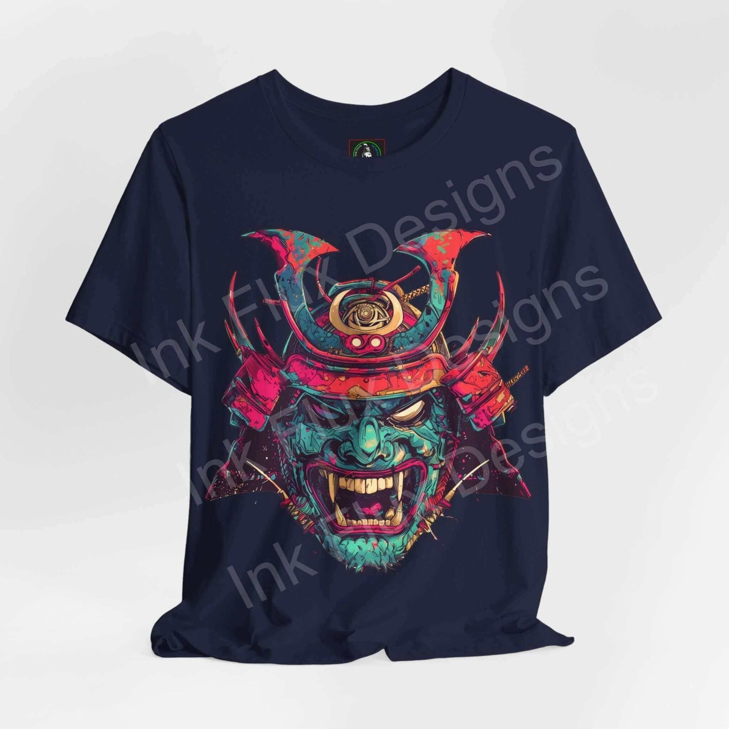 Navy blue unisex T-shirt with a vibrant, bold graphic of a Samurai mask in red and green, designed by Bella+Canvas, emphasizing comfort and style.