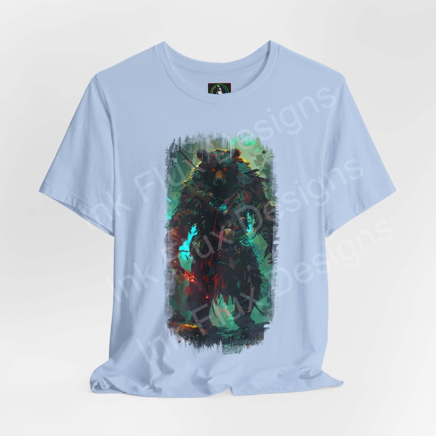 Light blue unisex T-shirt featuring a graphic of a Shamanistic Bear surrounded by spirit animals, perfect for casual wear and ethically made by Bella+Canvas.