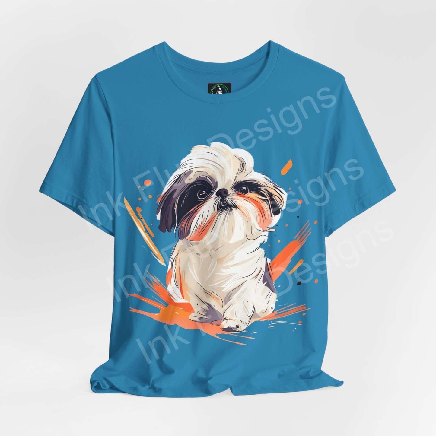 Stylish blue unisex T-shirt featuring a graphic print of a Shih Tzu, from Bella+Canvas, perfect for dog lovers and fashion enthusiasts.